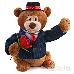 54005 Игрушка Медвежонок-гуляка, поёт, 29 см + батарейки АА - 3 шт. 54005 Игрушка Медвежонок-гуляка, поёт, 29 см + батарейки АА - 3 шт.