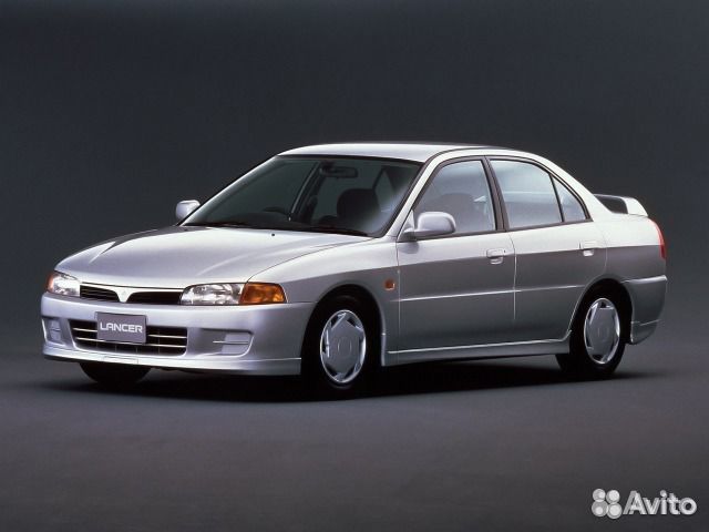 Радиатор Mitsubishi Lancer