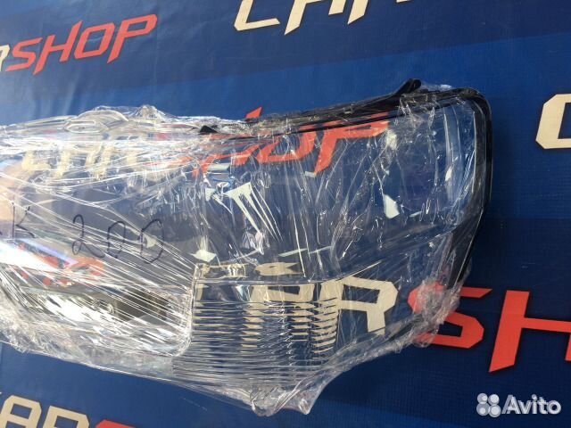 Toyota Land Cruiser 200 с 16- левое стекло фары ор