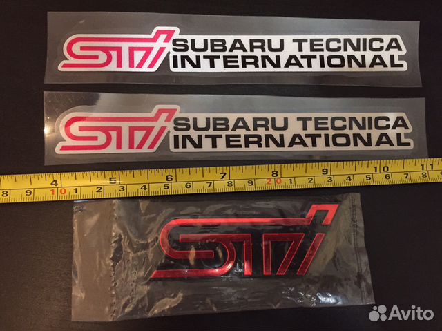 Эмблема STI Subaru