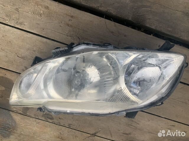 Фара левая Toyota Corolla E15
