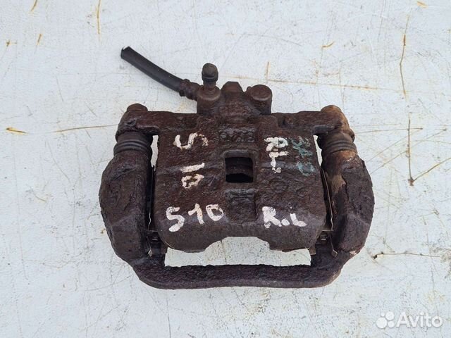 Суппорт задний тормозной Subaru Forester S10